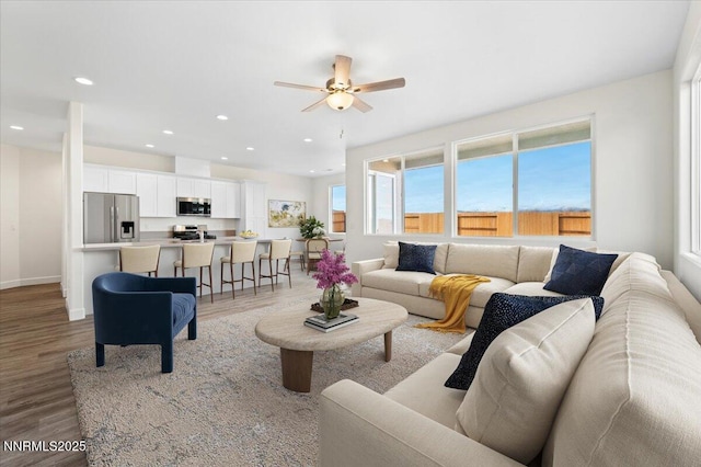 847 Agate Way, Fernley, NV 89408 - living area featuring wood finished floors, ceiling fan, and recessed lighting