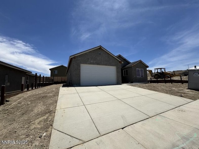847 Agate Way, Fernley, NV 89408 - view of front of property with a garage and concrete driveway