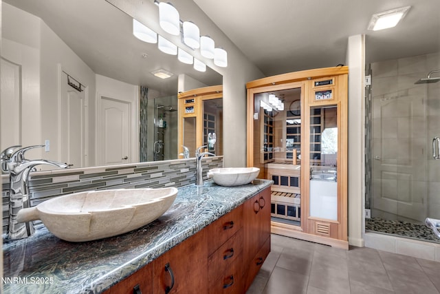 17000 Wedge Pkwy Unit 1221, Reno, NV 89511 - full bath with a stall shower, decorative backsplash, double vanity, and tile patterned floors