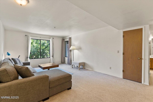 3095 Lakeside Dr # 103, Reno, NV 89509 - carpeted living room with baseboards