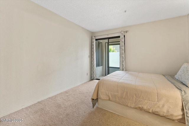 3095 Lakeside Dr # 103, Reno, NV 89509 - bedroom with carpet floors and a textured ceiling