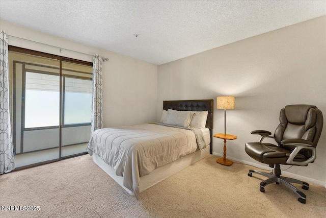 3095 Lakeside Dr # 103, Reno, NV 89509 - carpeted bedroom with a textured ceiling