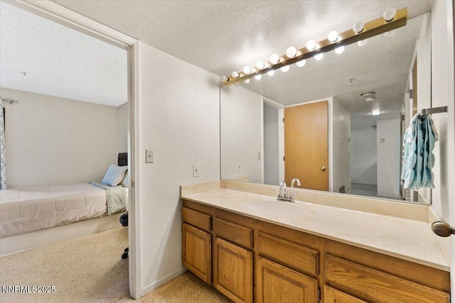 3095 Lakeside Dr # 103, Reno, NV 89509 - bathroom with vanity, ensuite bath, and a textured ceiling