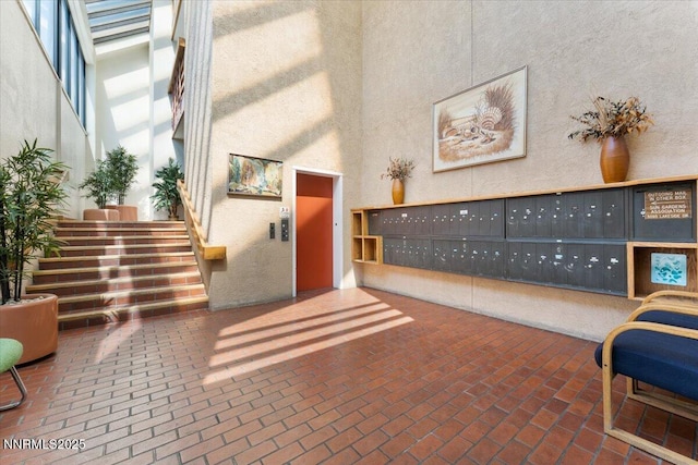 3095 Lakeside Dr # 103, Reno, NV 89509 - lobby with a high ceiling and a textured wall
