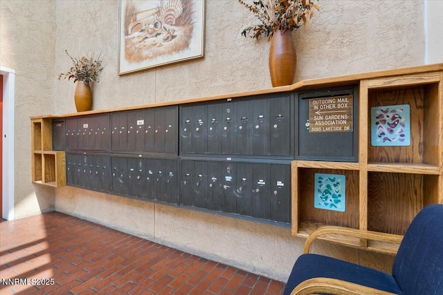 3095 Lakeside Dr # 103, Reno, NV 89509 - view of property's community with mail area and a textured wall