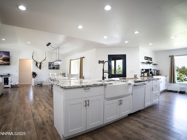 5875 Brooke Dr, Winnemucca, NV 89445 - kitchen with white dishwasher, dark wood-type flooring, light stone counters, recessed lighting, and white cabinets