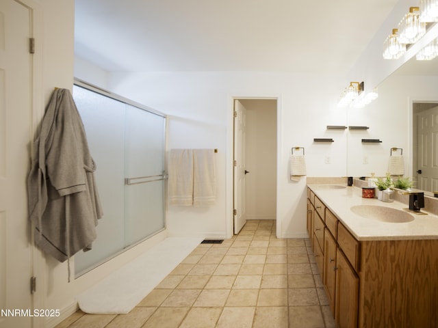 5875 Brooke Dr, Winnemucca, NV 89445 - full bathroom featuring double vanity and a shower with shower door