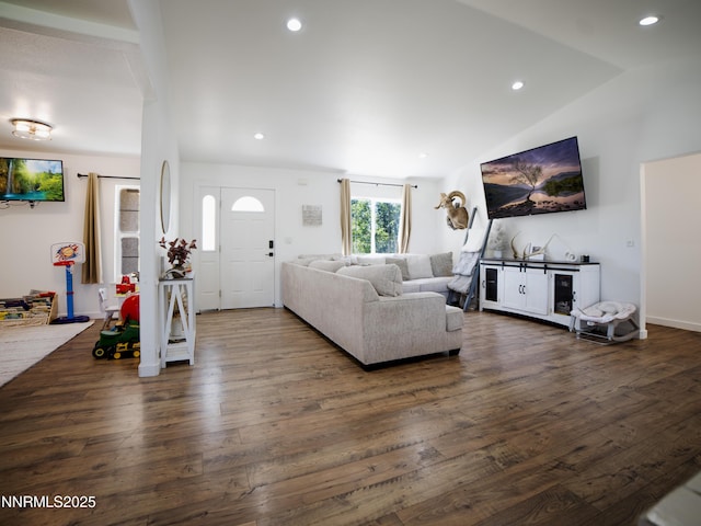 5875 Brooke Dr, Winnemucca, NV 89445 - living area featuring dark wood-style flooring, lofted ceiling, and recessed lighting