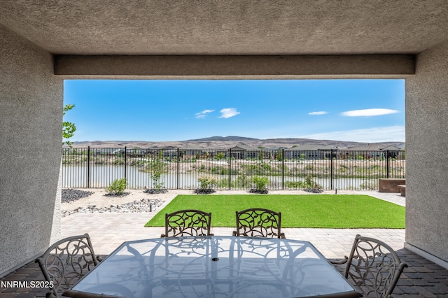 7436 Rustic Towers Dr, Sparks, NV 89441 - fenced backyard featuring a water and mountain view and a patio area