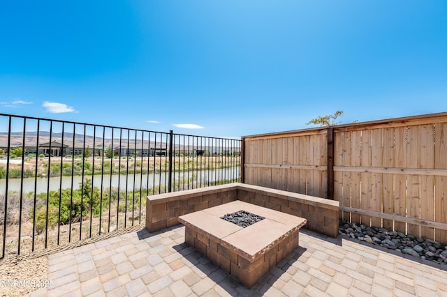 7436 Rustic Towers Dr, Sparks, NV 89441 - view of patio with a fire pit