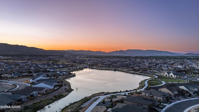 7436 Rustic Towers Dr, Sparks, NV 89441 - aerial perspective of suburban area with a water and mountain view