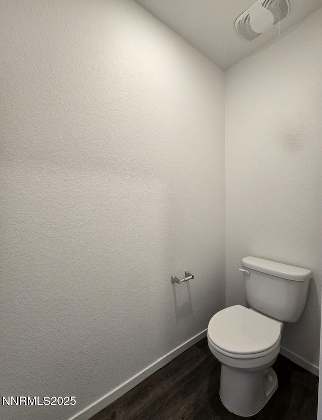 9615 Nautical Mile Rd, Reno, NV 89506 - bathroom featuring wood finished floors and toilet