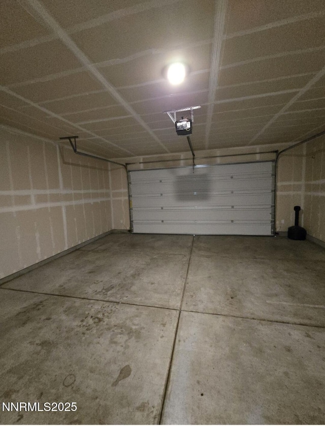 9615 Nautical Mile Rd, Reno, NV 89506 - garage with a garage door opener