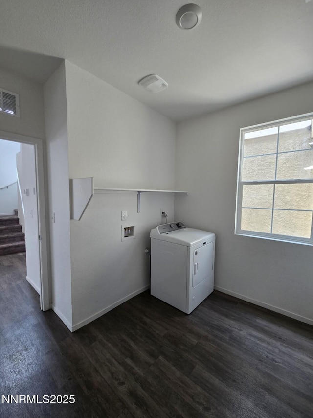 9615 Nautical Mile Rd, Reno, NV 89506 - laundry room featuring washer / clothes dryer and dark wood finished floors