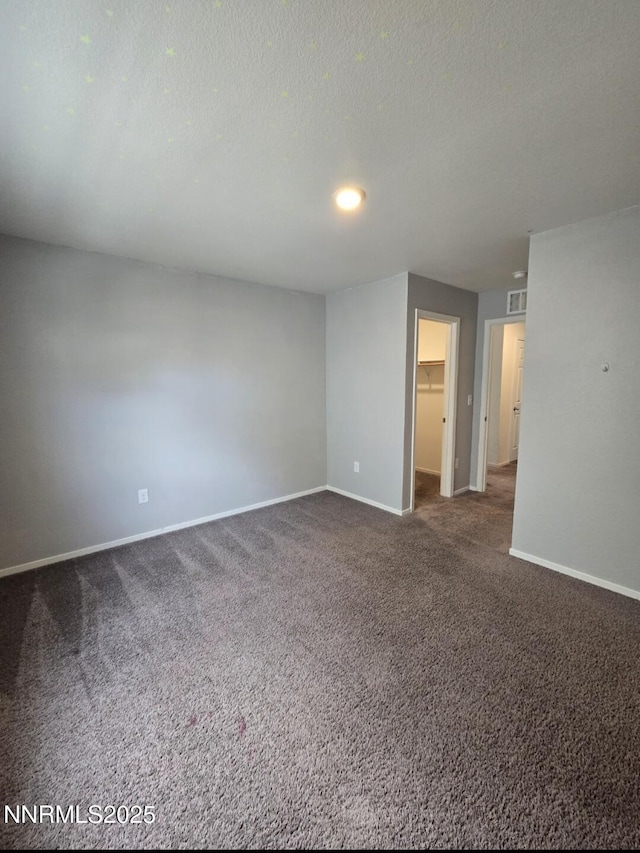 9615 Nautical Mile Rd, Reno, NV 89506 - carpeted empty room featuring baseboards