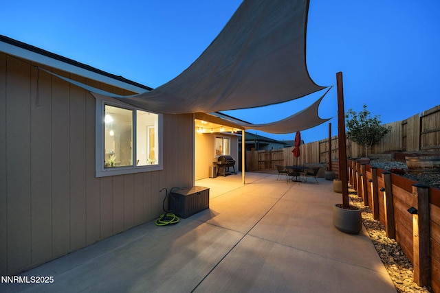 1827 Hickory Ln, Fernley, NV 89408 - fenced backyard with a patio area, outdoor dining space, and area for grilling