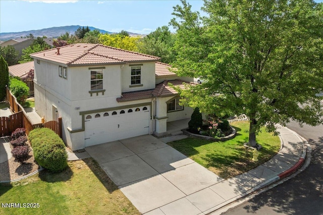 2865 Cintoia Dr, Sparks, NV 89434 - mediterranean / spanish-style home with a tiled roof, a garage, stucco siding, and concrete driveway