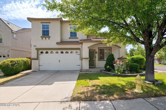 2865 Cintoia Dr, Sparks, NV 89434 - mediterranean / spanish house featuring a tile roof, stucco siding, driveway, a garage, and a front yard