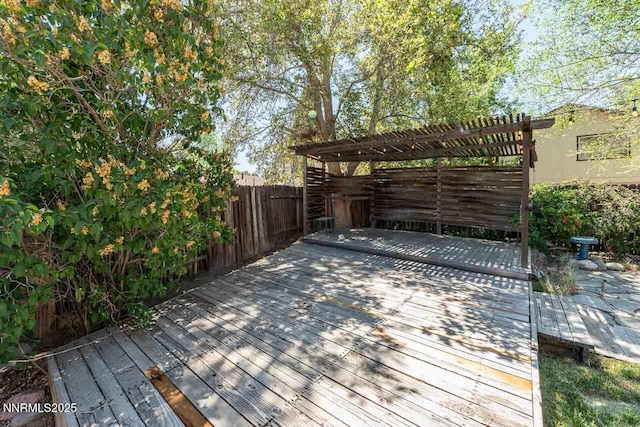 1245 Junction Ct, Sparks, NV 89434 - wooden deck with a pergola and a fenced backyard