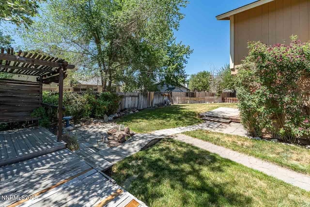 1245 Junction Ct, Sparks, NV 89434 - fenced backyard featuring a pergola and a wooden deck