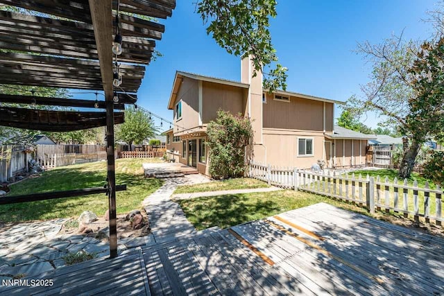 1245 Junction Ct, Sparks, NV 89434 - back of property with a pergola, a fenced backyard, and a patio area