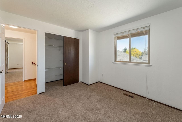 1245 Junction Ct, Sparks, NV 89434 - unfurnished bedroom with light colored carpet and a closet