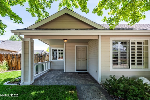 1421 Chiltern Ct, Gardnerville, NV 89410 - view of front facade featuring a patio area and a shingled roof