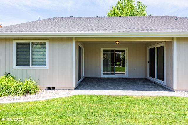 1421 Chiltern Ct, Gardnerville, NV 89410 - back of house featuring a patio, a yard, and a shingled roof