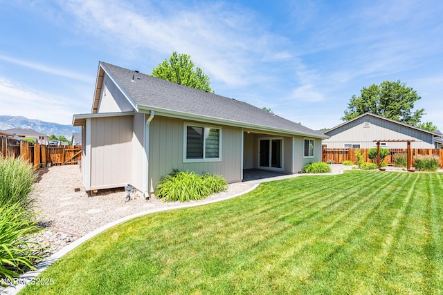 1421 Chiltern Ct, Gardnerville, NV 89410 - rear view of house featuring a fenced backyard and a shingled roof