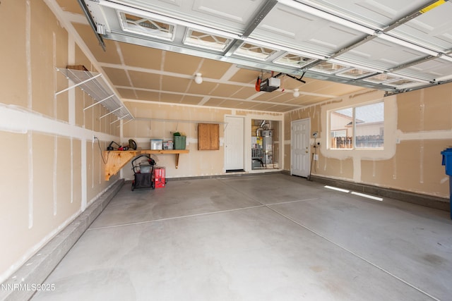 1421 Chiltern Ct, Gardnerville, NV 89410 - garage featuring a garage door opener and secured water heater