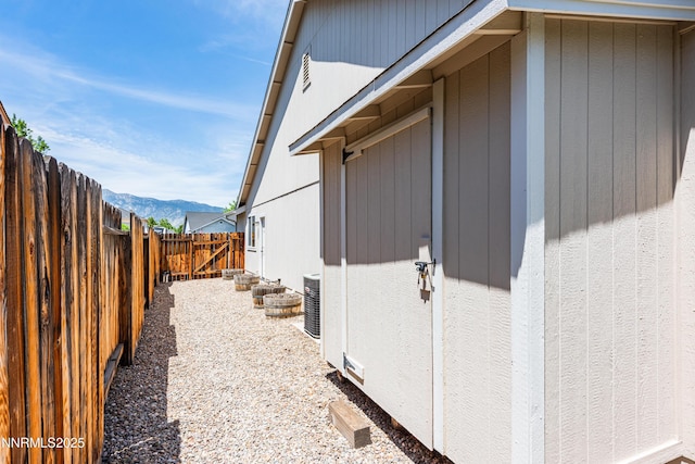 1421 Chiltern Ct, Gardnerville, NV 89410 - view of side of home with a fenced backyard and a mountain view