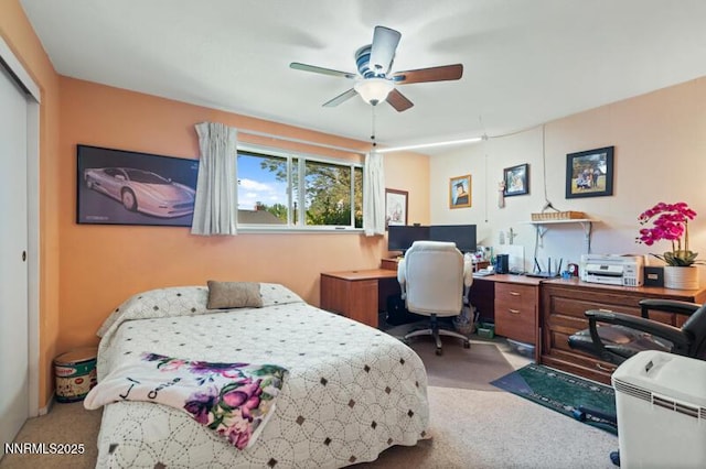 4385 Valdez Way, Reno, NV 89502 - bedroom with carpet flooring, a desk, a closet, and a ceiling fan