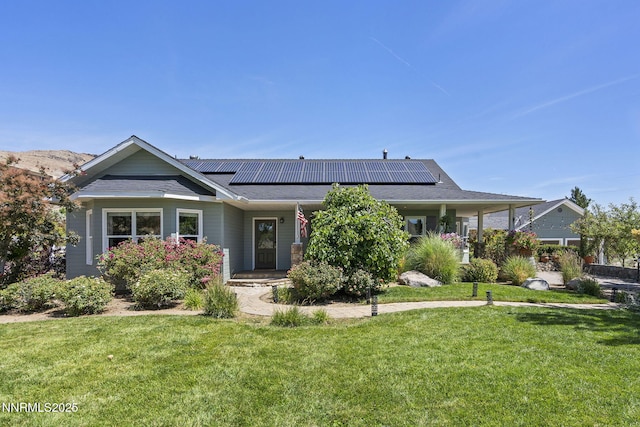 5 Connie Way, Reno, NV 89521 - view of front of property with a front yard and solar panels