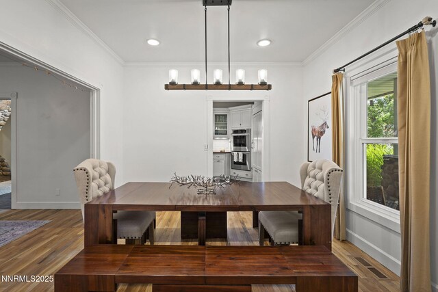 5 Connie Way, Reno, NV 89521 - dining space featuring wood finished floors, crown molding, and recessed lighting