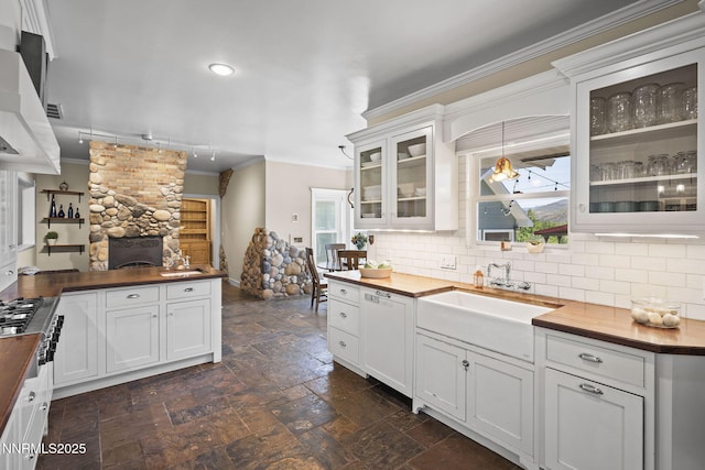 5 Connie Way, Reno, NV 89521 - kitchen with wood counters, ornamental molding, stone tile flooring, a stone fireplace, and recessed lighting