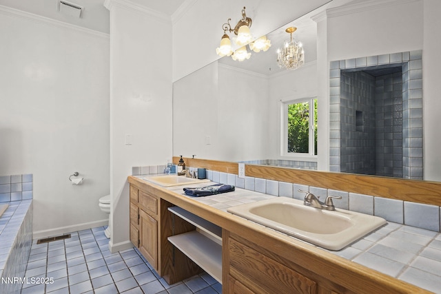 5 Connie Way, Reno, NV 89521 - bathroom featuring double vanity, a chandelier, tile patterned floors, and crown molding