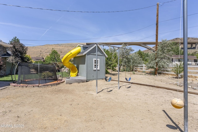 5 Connie Way, Reno, NV 89521 - view of outdoor structure with a trampoline and a playground