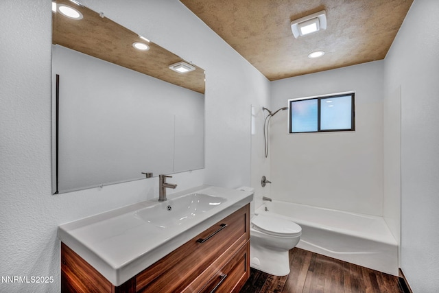 638 N Martin Dr, Zephyr Cove, NV 89448 - full bathroom with vanity, wood finished floors, recessed lighting, and washtub / shower combination