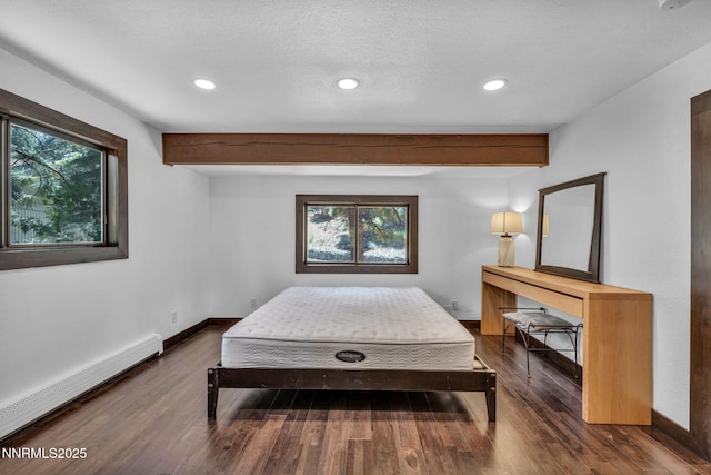 638 N Martin Dr, Zephyr Cove, NV 89448 - bedroom with a baseboard heating unit, beam ceiling, wood finished floors, recessed lighting, and a textured ceiling