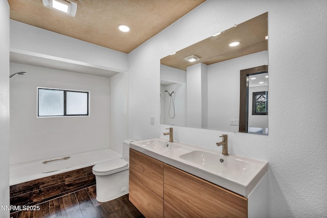 638 N Martin Dr, Zephyr Cove, NV 89448 - bathroom with wood finished floors, double vanity, a shower, and recessed lighting