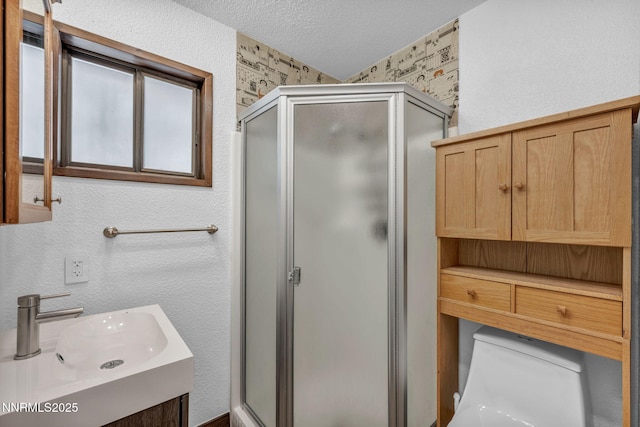 638 N Martin Dr, Zephyr Cove, NV 89448 - bathroom featuring a shower stall, a textured ceiling, and vanity