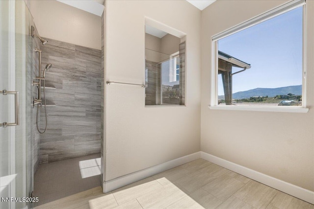 435 Gooseberry Dr, Reno, NV 89523 - bathroom featuring a tile shower and a mountain view