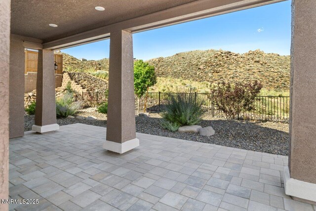 435 Gooseberry Dr, Reno, NV 89523 - fenced backyard with a patio area and a mountain view