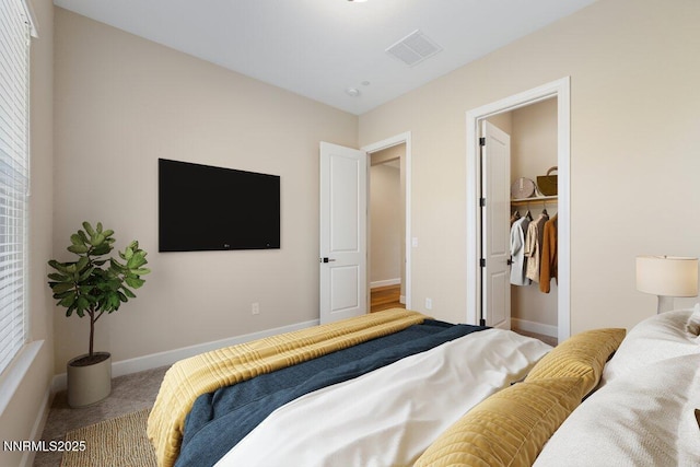 435 Gooseberry Dr, Reno, NV 89523 - carpeted bedroom with baseboards and a walk in closet