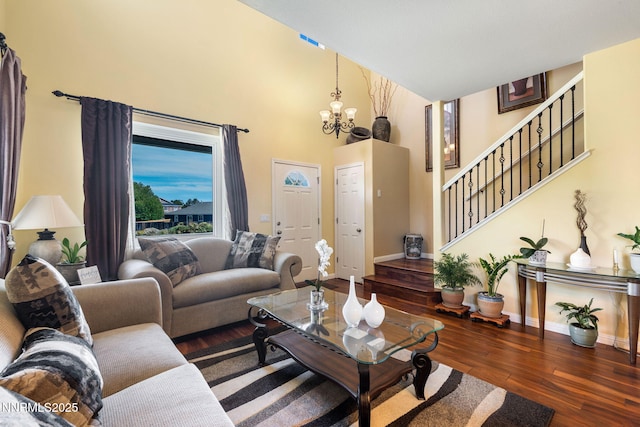 5455 Montego Ct, Reno, NV 89523 - living room with stairs, hardwood / wood-style floors, a high ceiling, and a chandelier