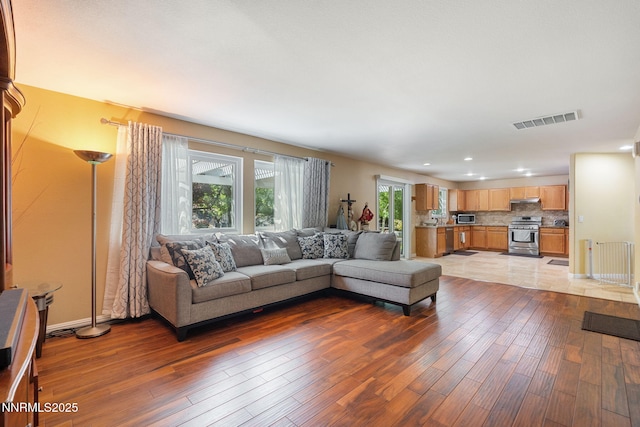 5455 Montego Ct, Reno, NV 89523 - living room featuring hardwood / wood-style floors and recessed lighting