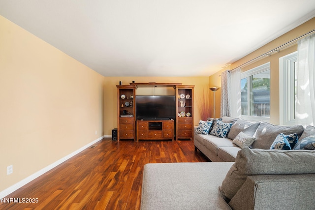 5455 Montego Ct, Reno, NV 89523 - living room featuring dark wood-style flooring and baseboards