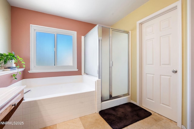 5455 Montego Ct, Reno, NV 89523 - bathroom featuring a bath, a stall shower, and tile patterned floors