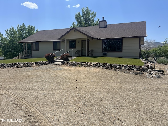 2855 Wilcox Ranch Rd, Reno, NV 89510 - ranch-style home with a chimney and a front lawn