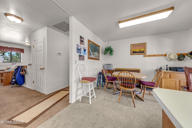 2855 Wilcox Ranch Rd, Reno, NV 89510 - dining space featuring light carpet and a textured ceiling